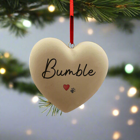 A Personalised Paw Print & Heart Ceramic Heart Bauble
